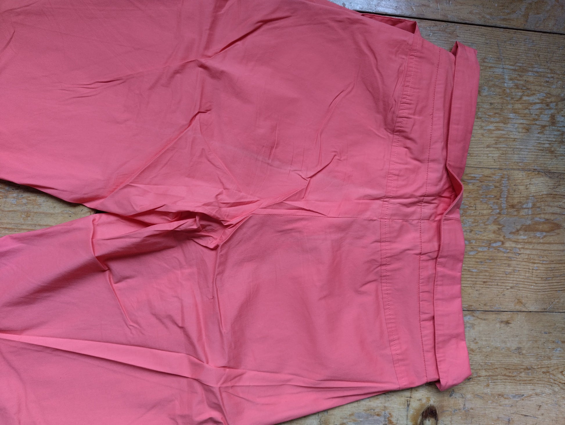 Detailed back view of the pink trousers