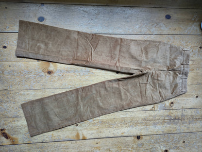 Back view of tan corduroy trousers