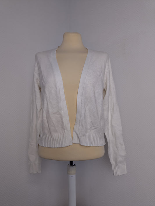 Front view of white cardigan on mannequin