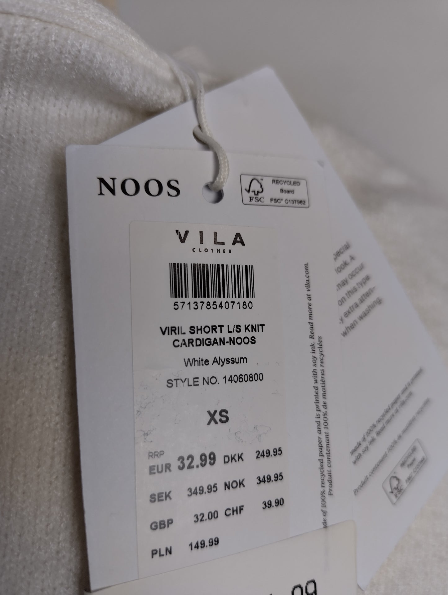 Close-up of Vila brand and size tag