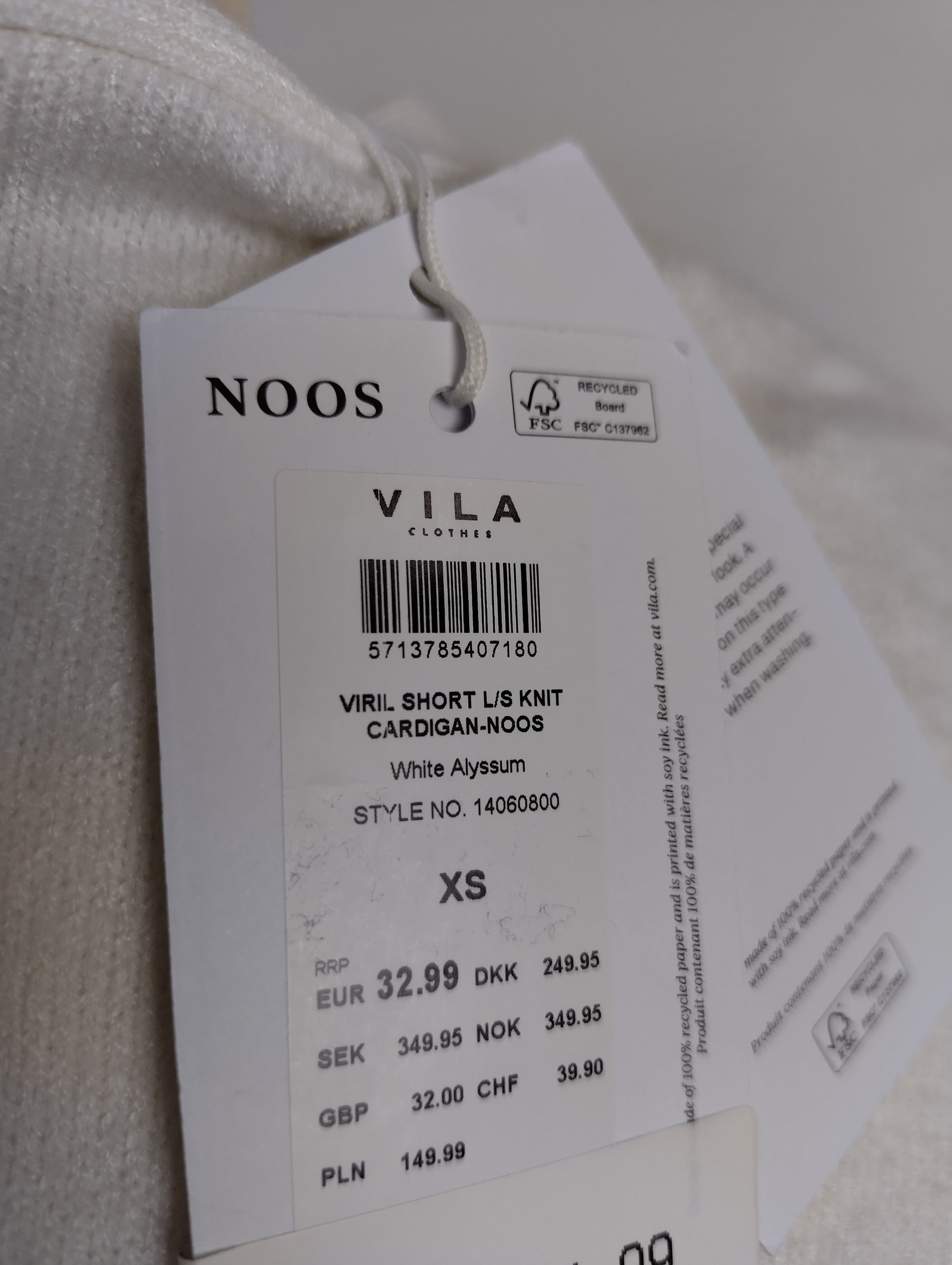 Close-up of Vila brand and size tag
