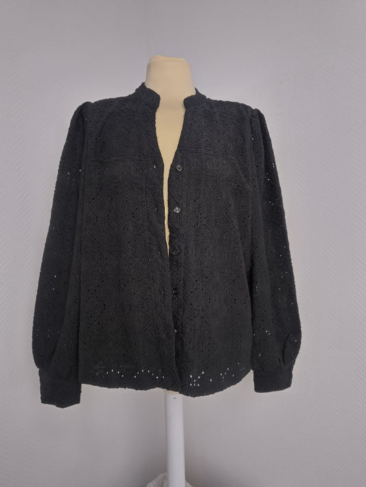 Front view of black embroidered long-sleeve shirt