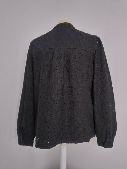 Back view of black embroidered long-sleeve shirt