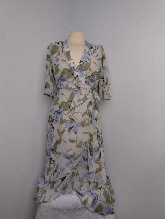Floral wrap dress on mannequin from the front