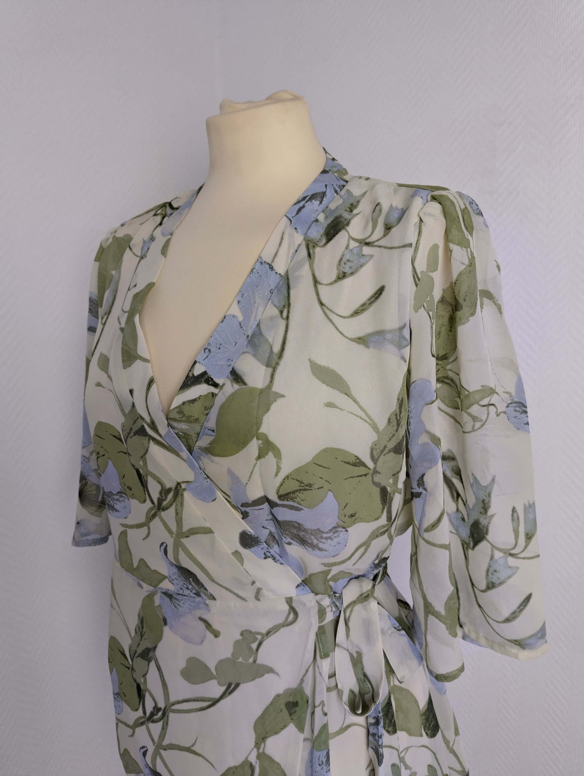 Close-up of floral dress wrap style