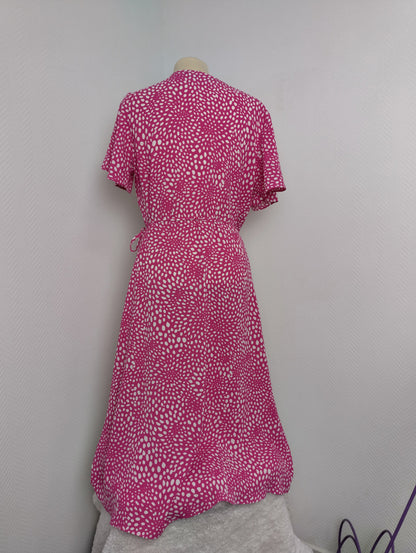 Back view of pink polka dot wrap dress by Vila