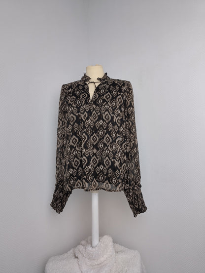 Front view of Vila patterned V-neck top