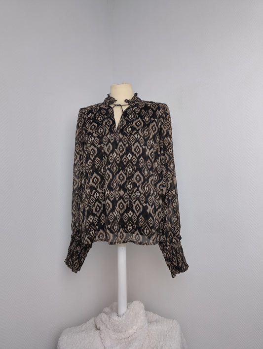 Front view of Vila patterned V-neck top