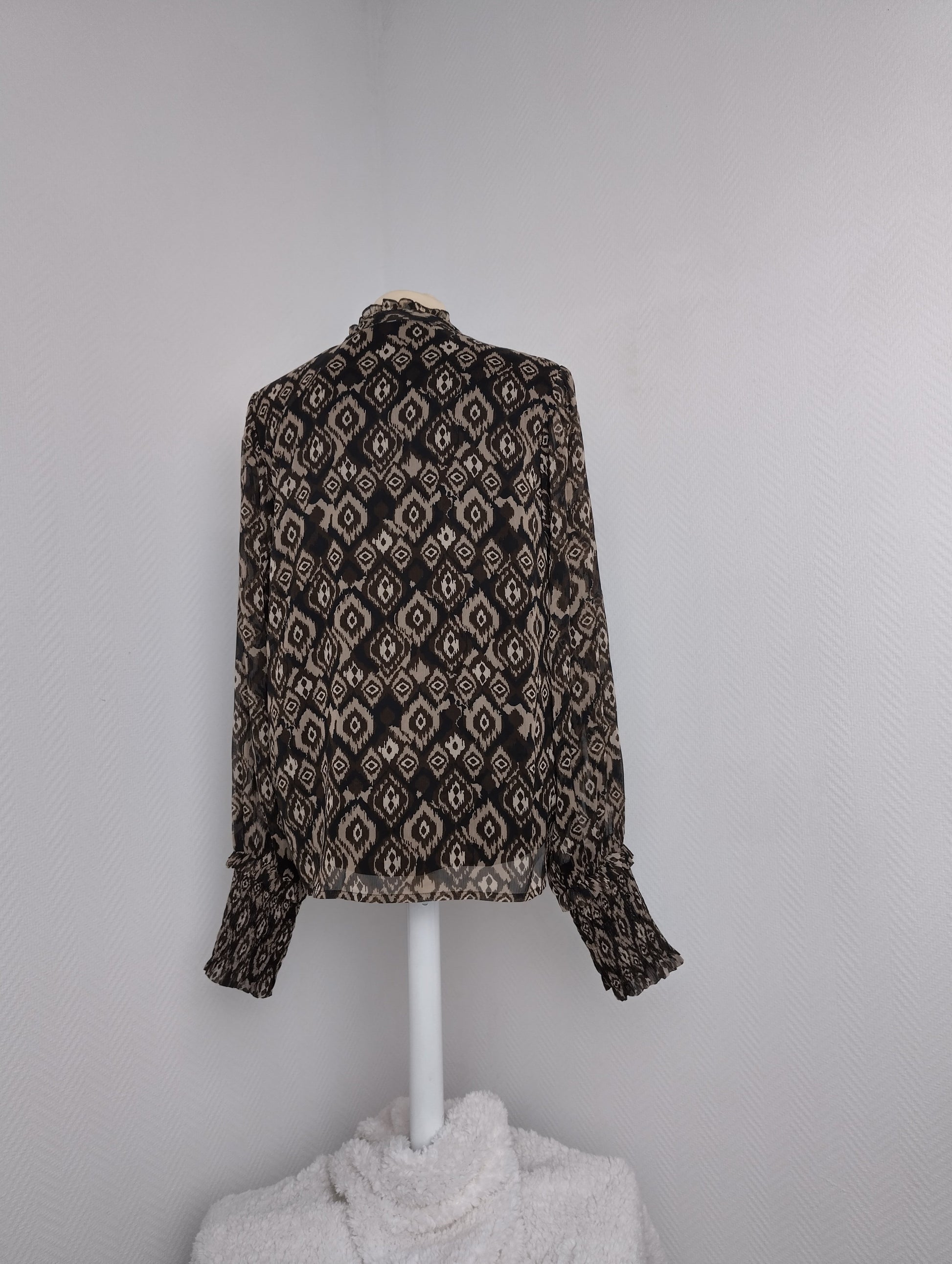 Back view of Vila patterned V-neck top