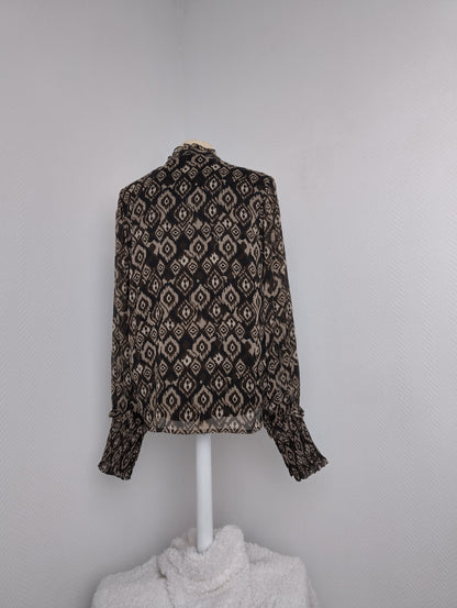 Back view of Vila patterned V-neck top
