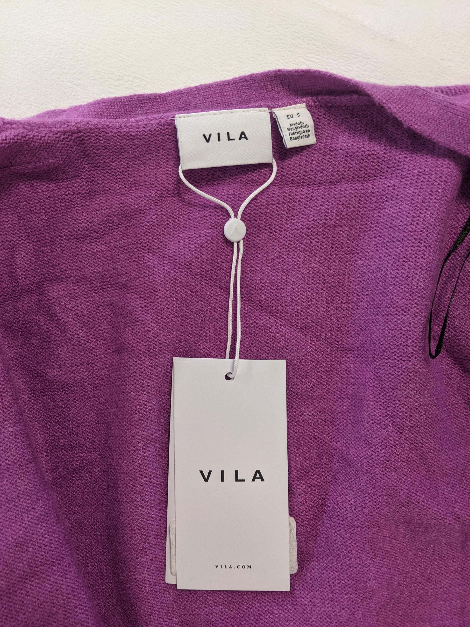 Vila brand tag on purple cardigan