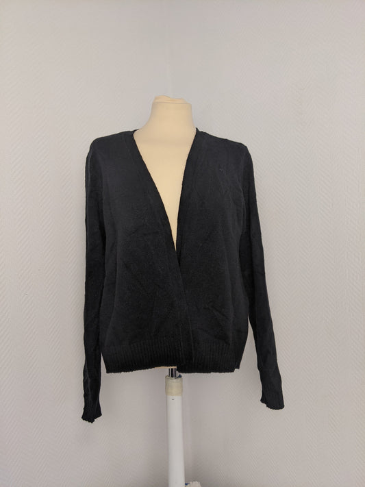Front view of black knit cardigan on mannequin
