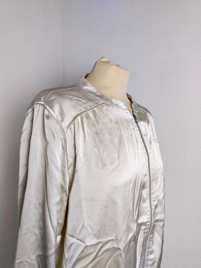Close-up of silver satin bomber jacket