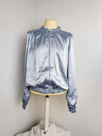 Front view of Vila light blue satin bomber jacket