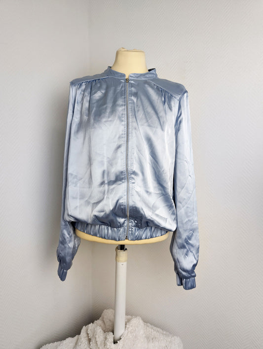Front view of Vila light blue satin bomber jacket
