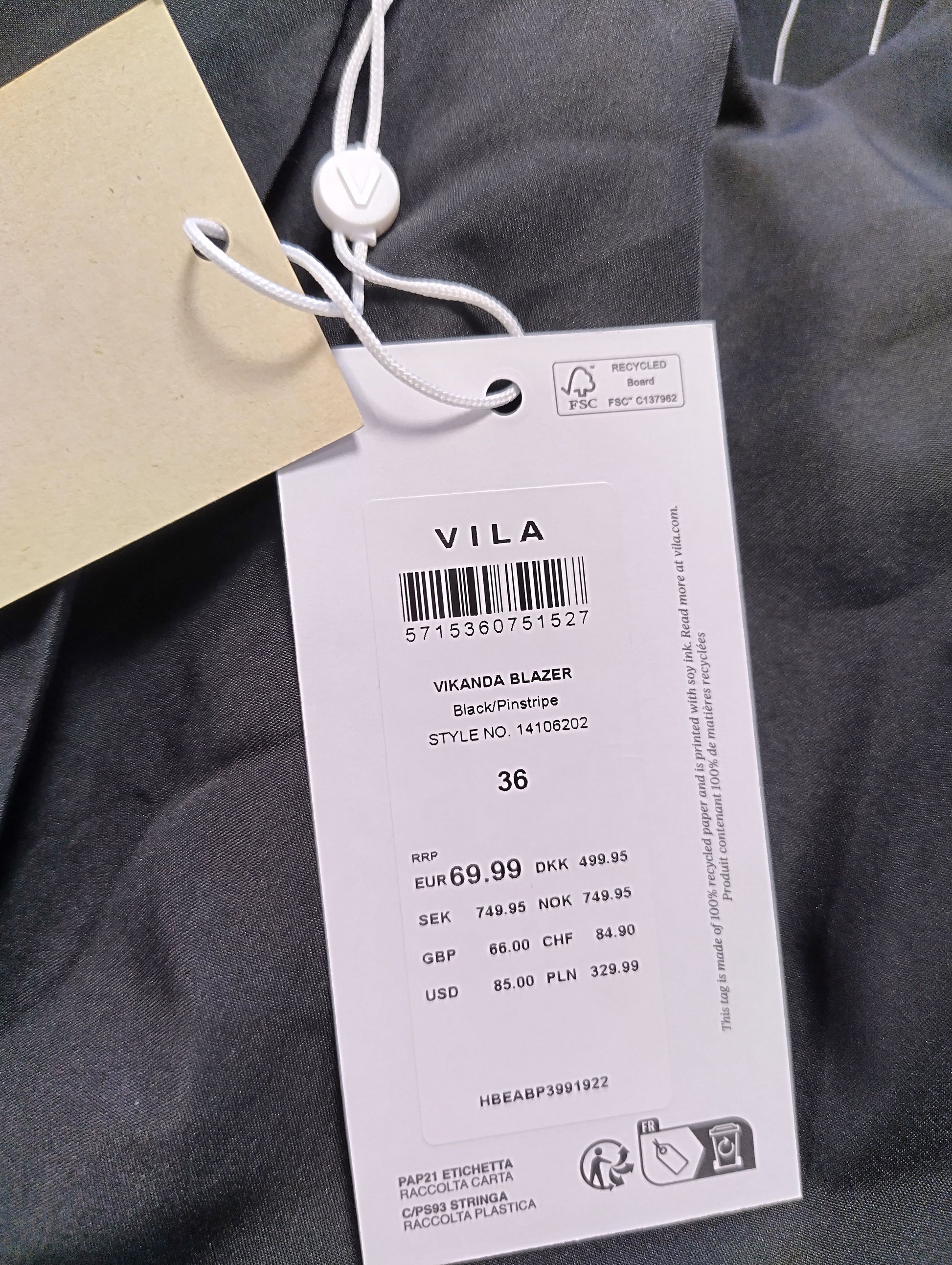 Tag showing details of Vila black pinstripe blazer