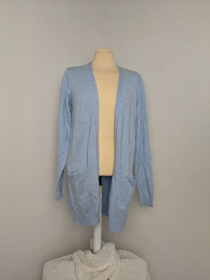 Light blue cardigan on a mannequin, front view