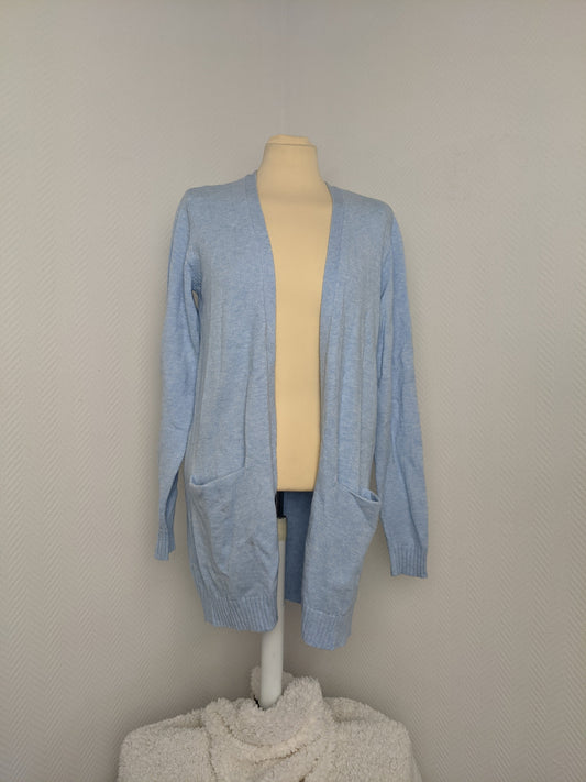 Light blue cardigan on a mannequin, front view