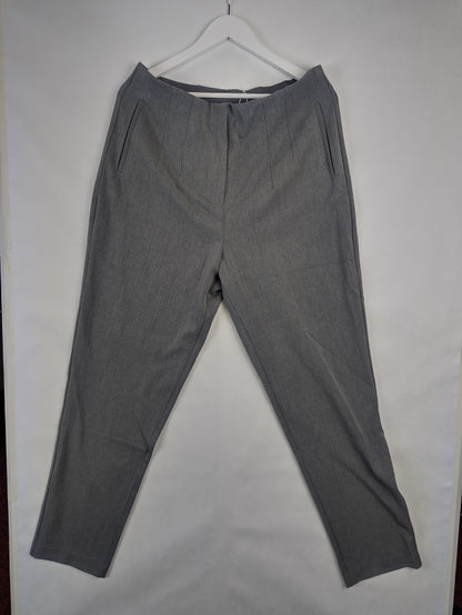 Front view of grey pants on hanger