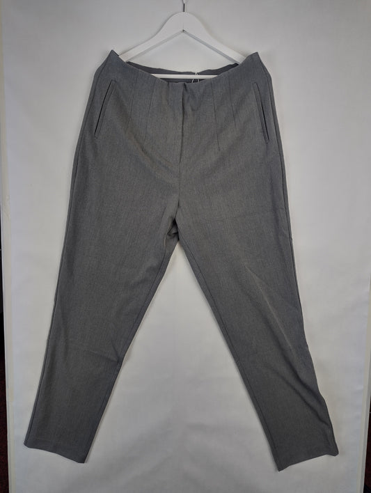Front view of grey pants on hanger