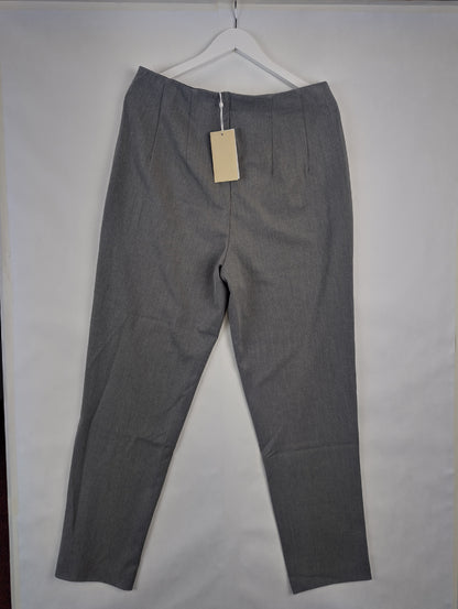 Back view of grey pants on hanger