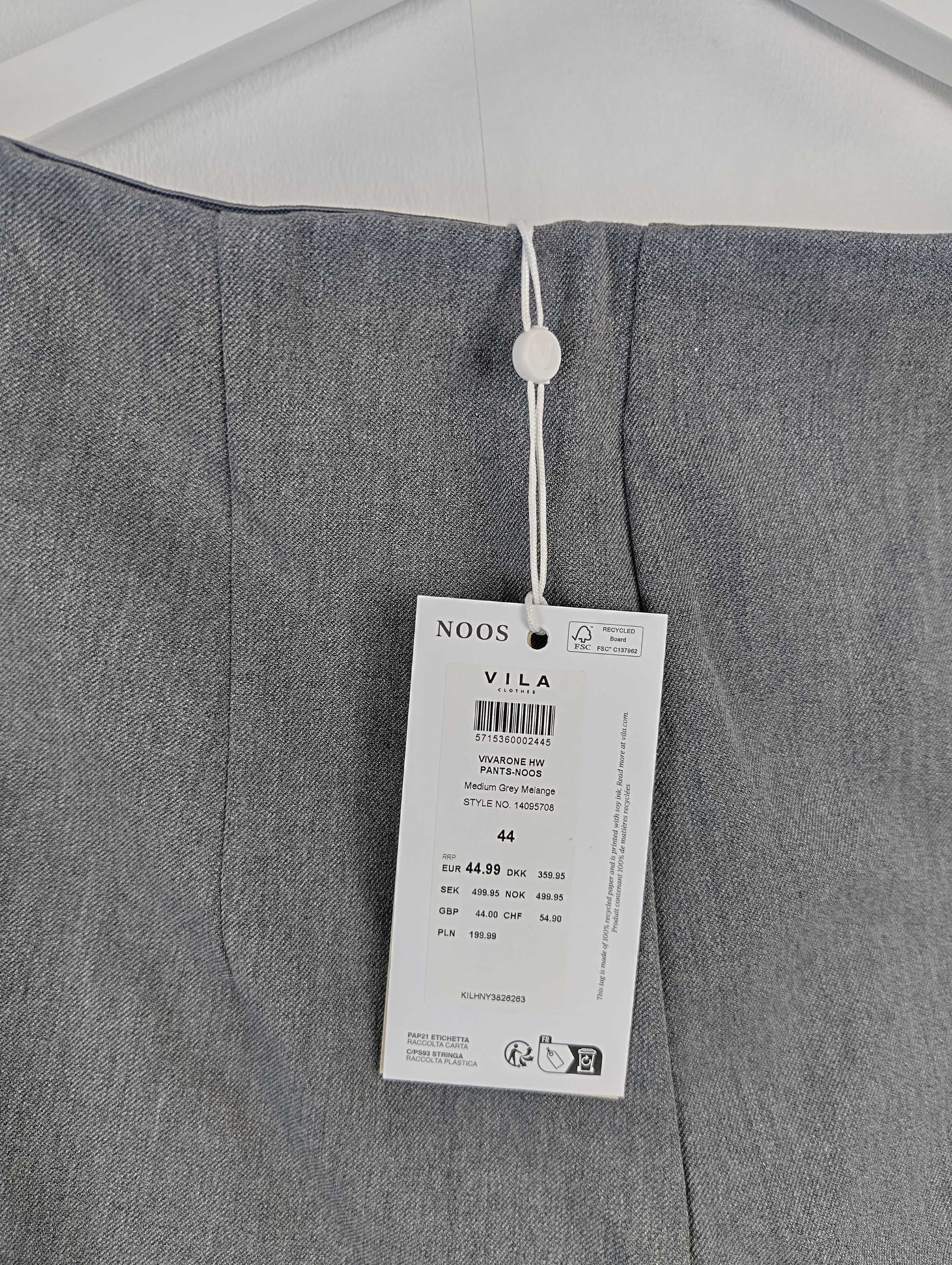 Close-up of label on grey pants