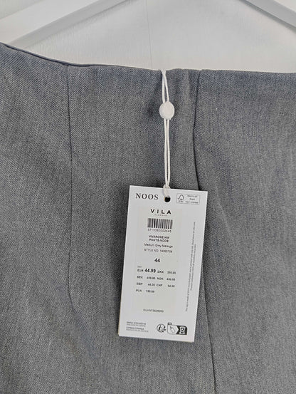 Close-up of label on grey pants