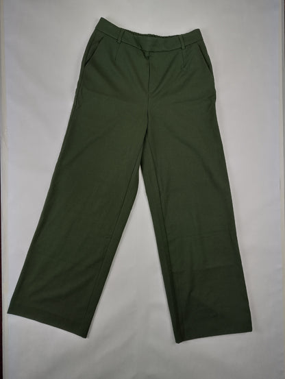 Front view of khaki green wide leg pants