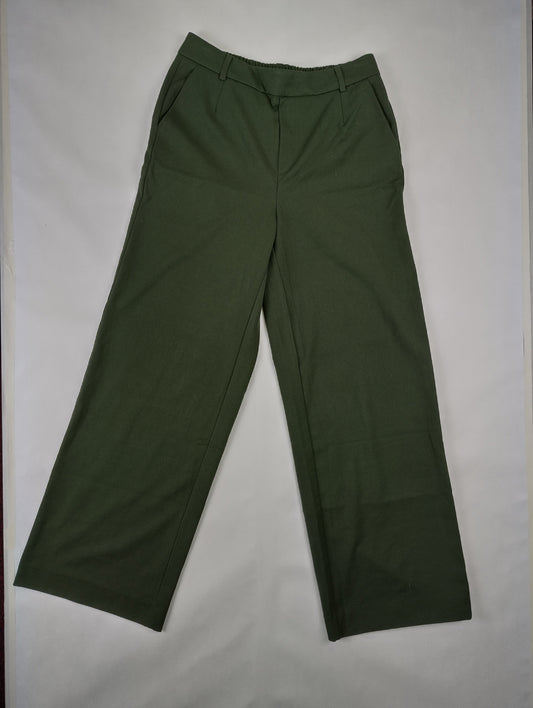 Front view of khaki green wide leg pants