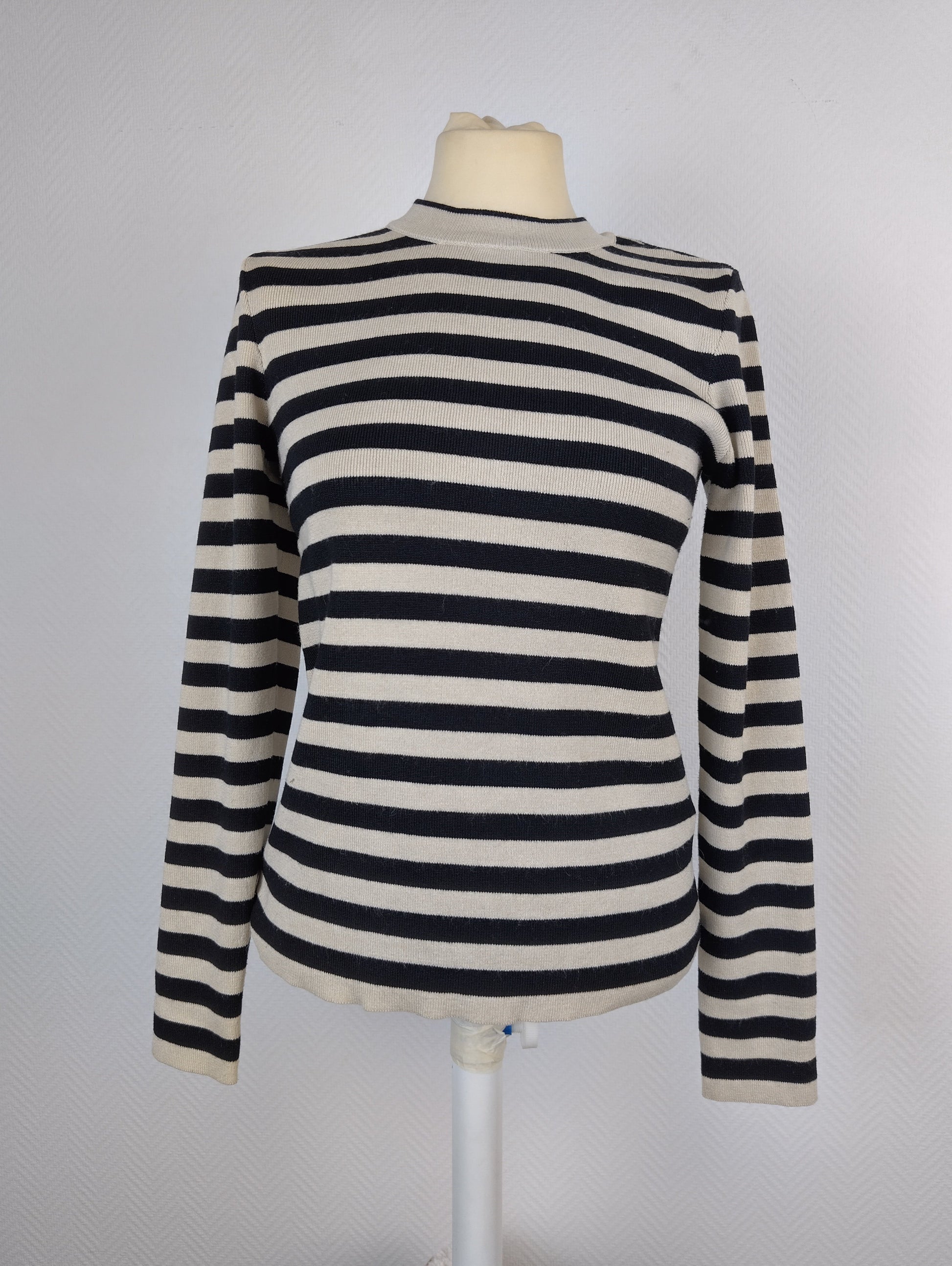 Front view of striped knit pullover