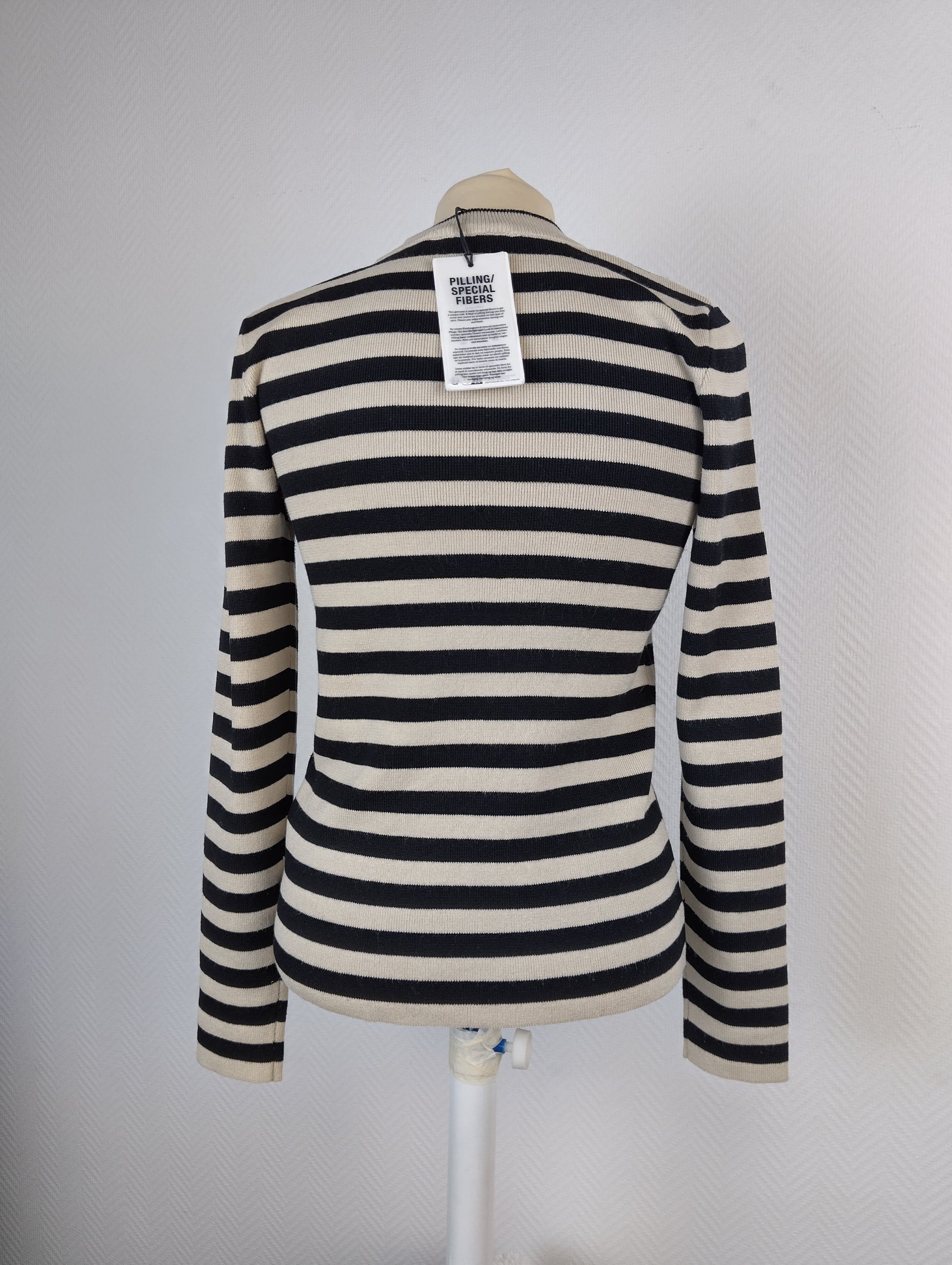 Back view of striped knit pullover