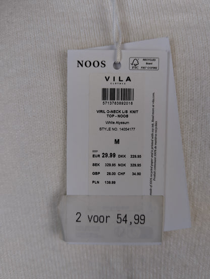 Close-up of tag showing details and pricing