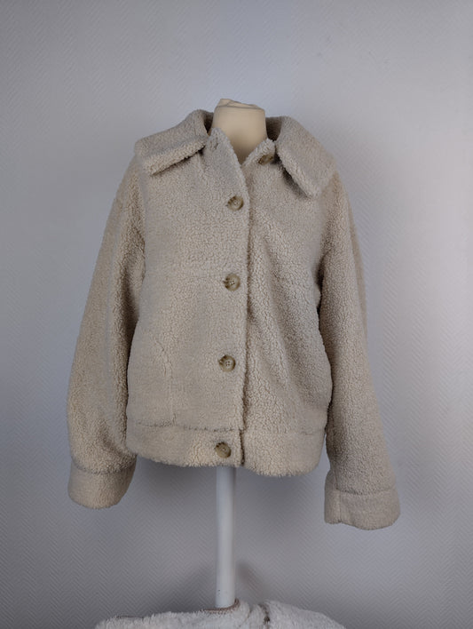 Front view of beige sherpa jacket