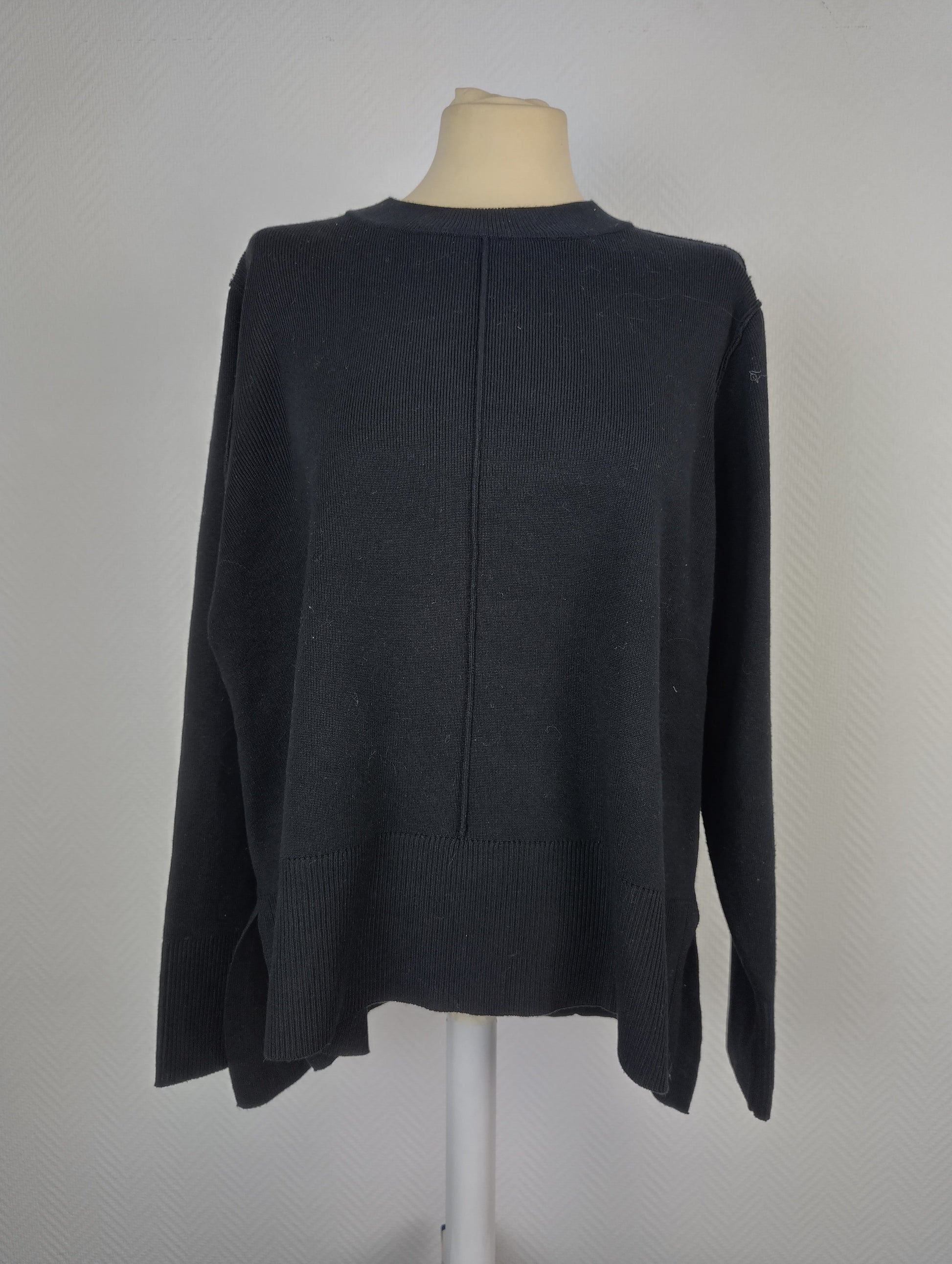 Front view of black Vila knit sweater
