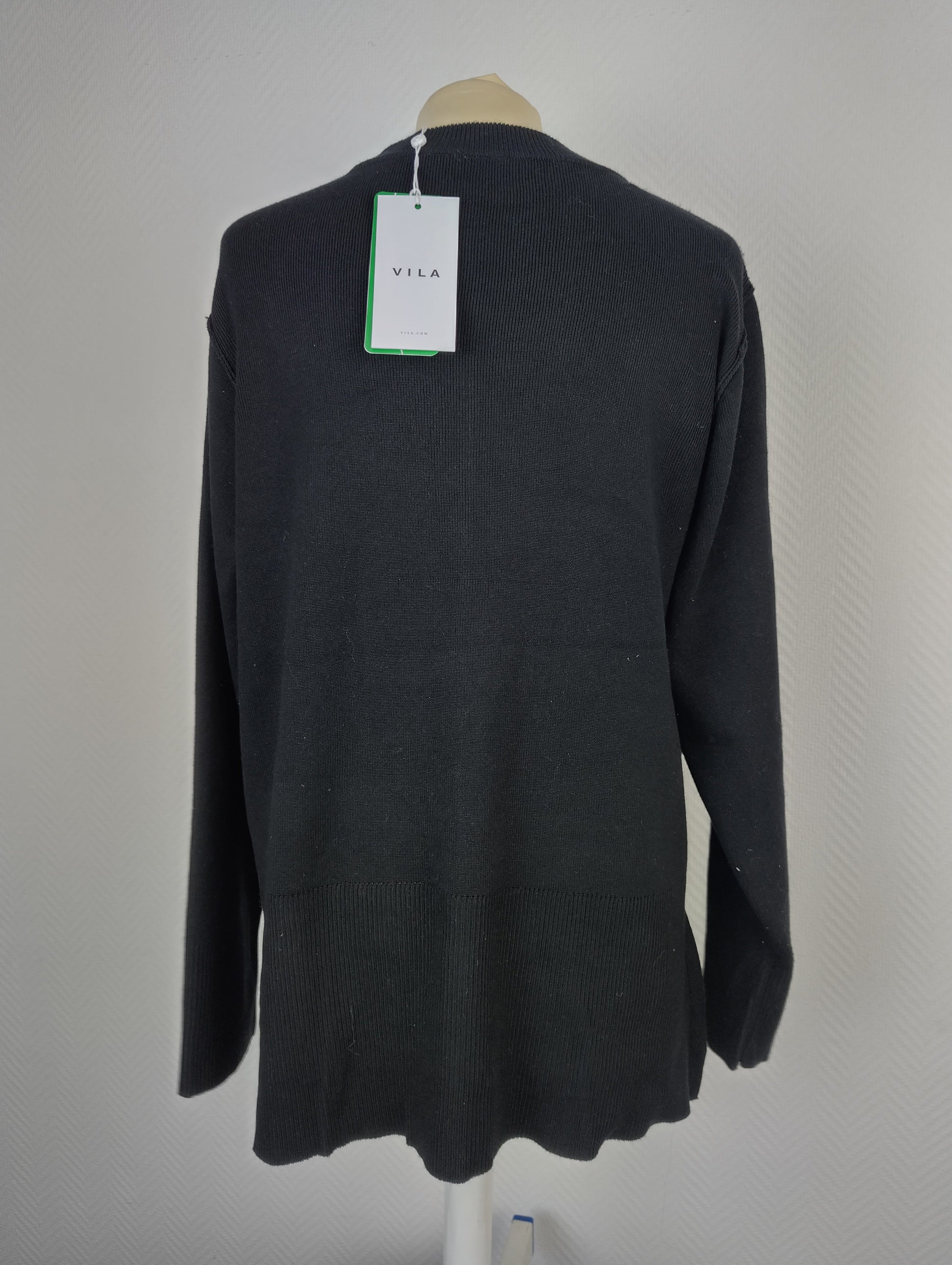 Back view of black Vila knit sweater