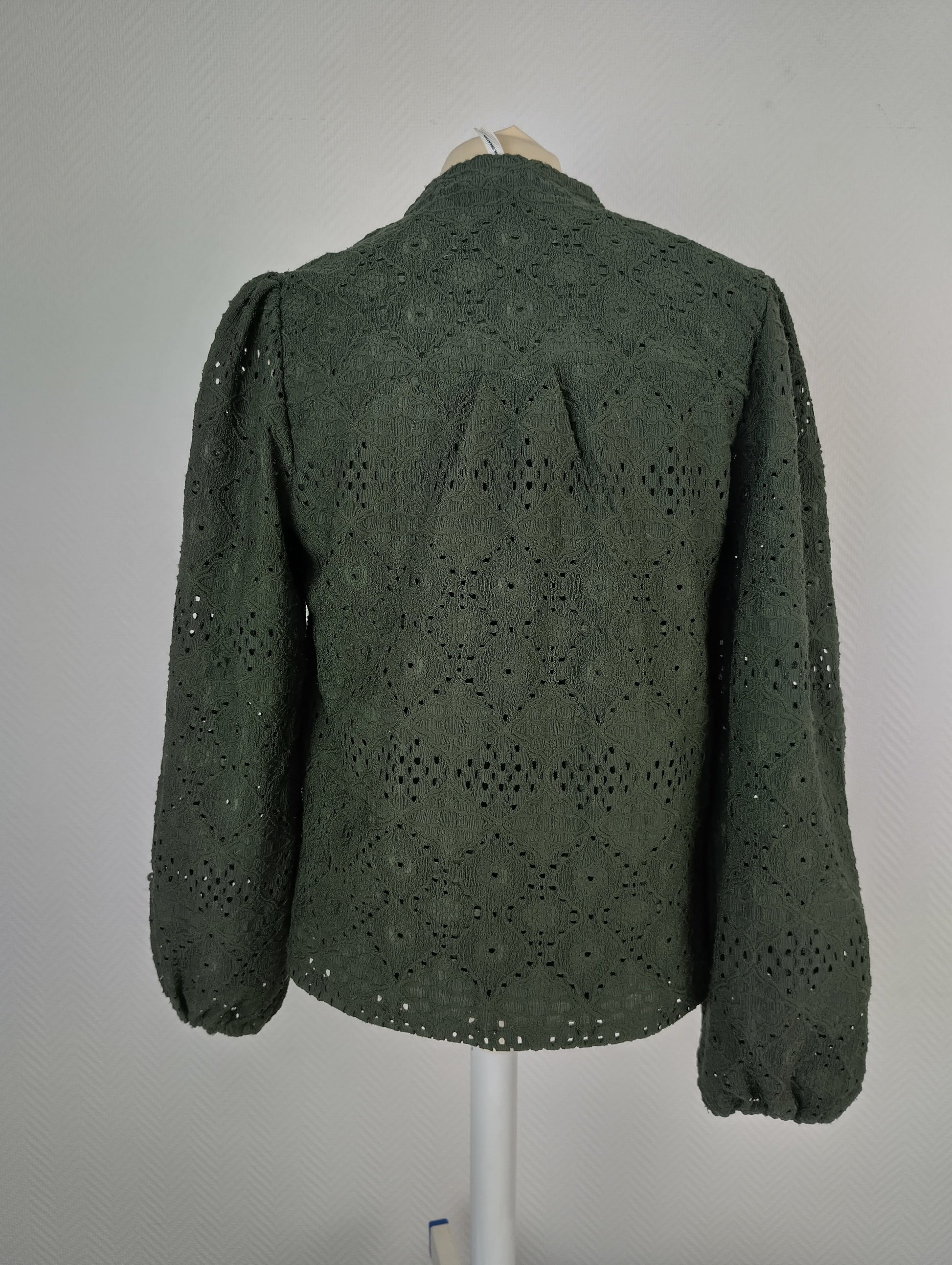 Back view of dark green lace blouse