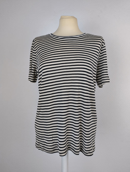 Front view of black and white striped T-shirt on mannequin