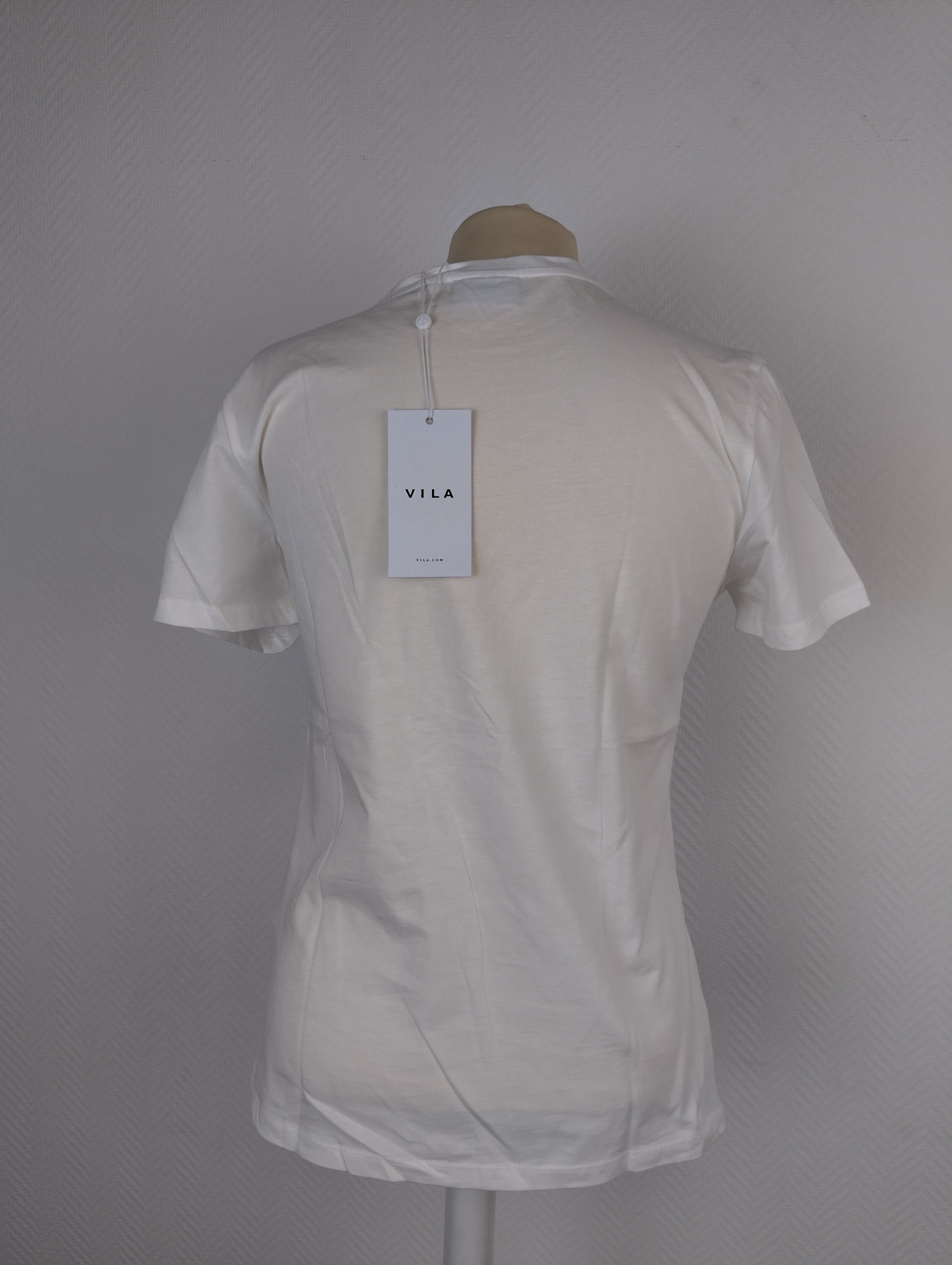 Back view of Vila T-shirt with tag attached