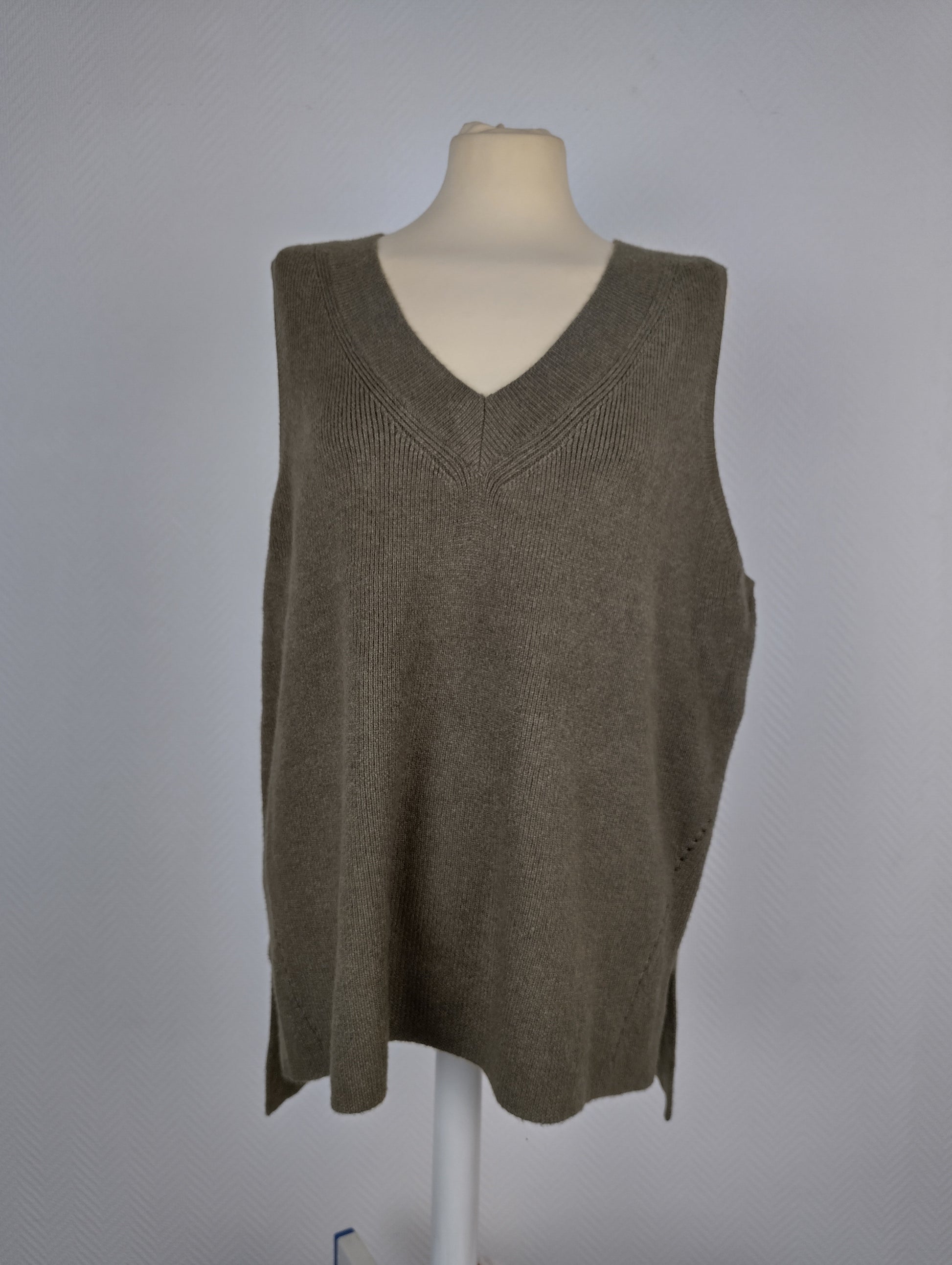 Side view of olive green knit vest