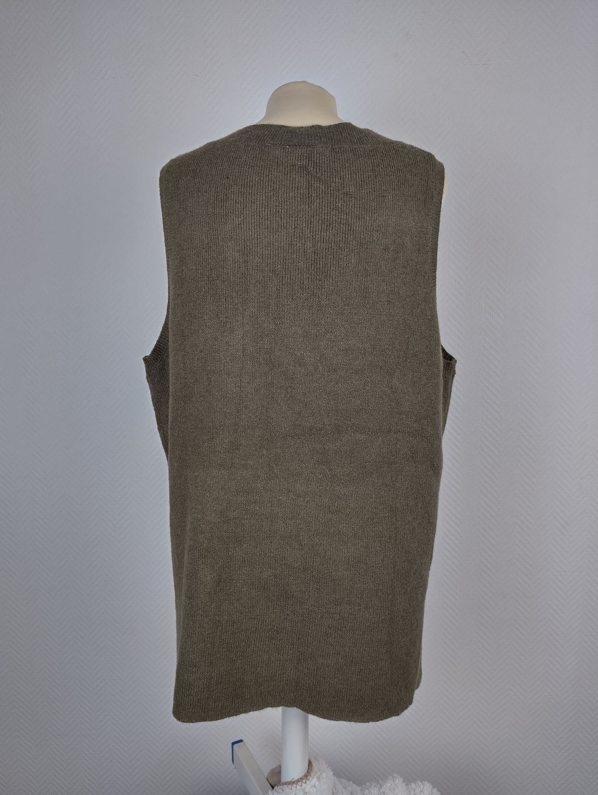 Back view of olive green knit vest