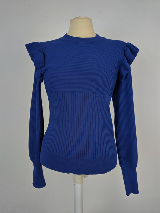Front view of royal blue ruffle shoulder sweater