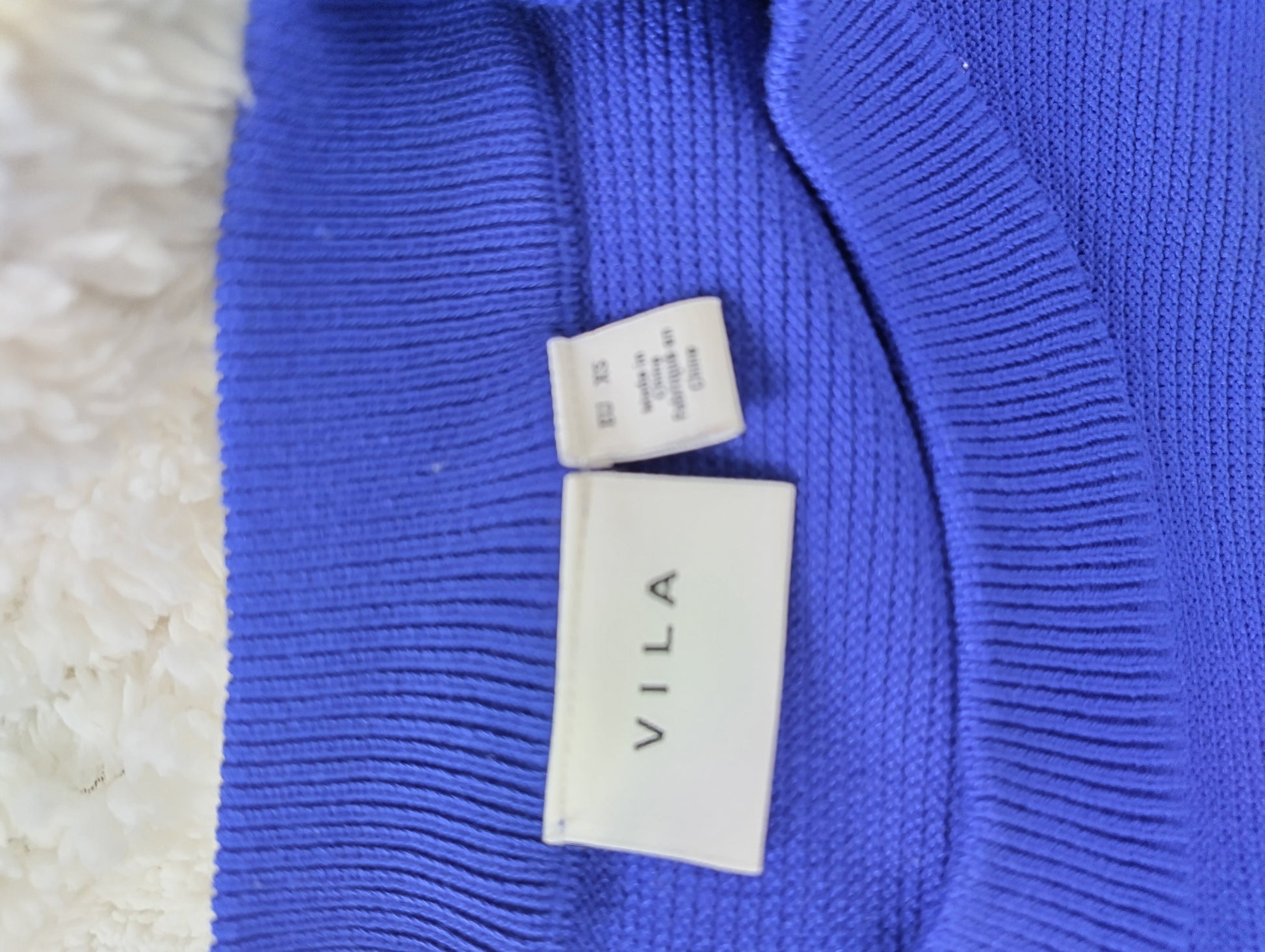 Close-up of Vila brand tag