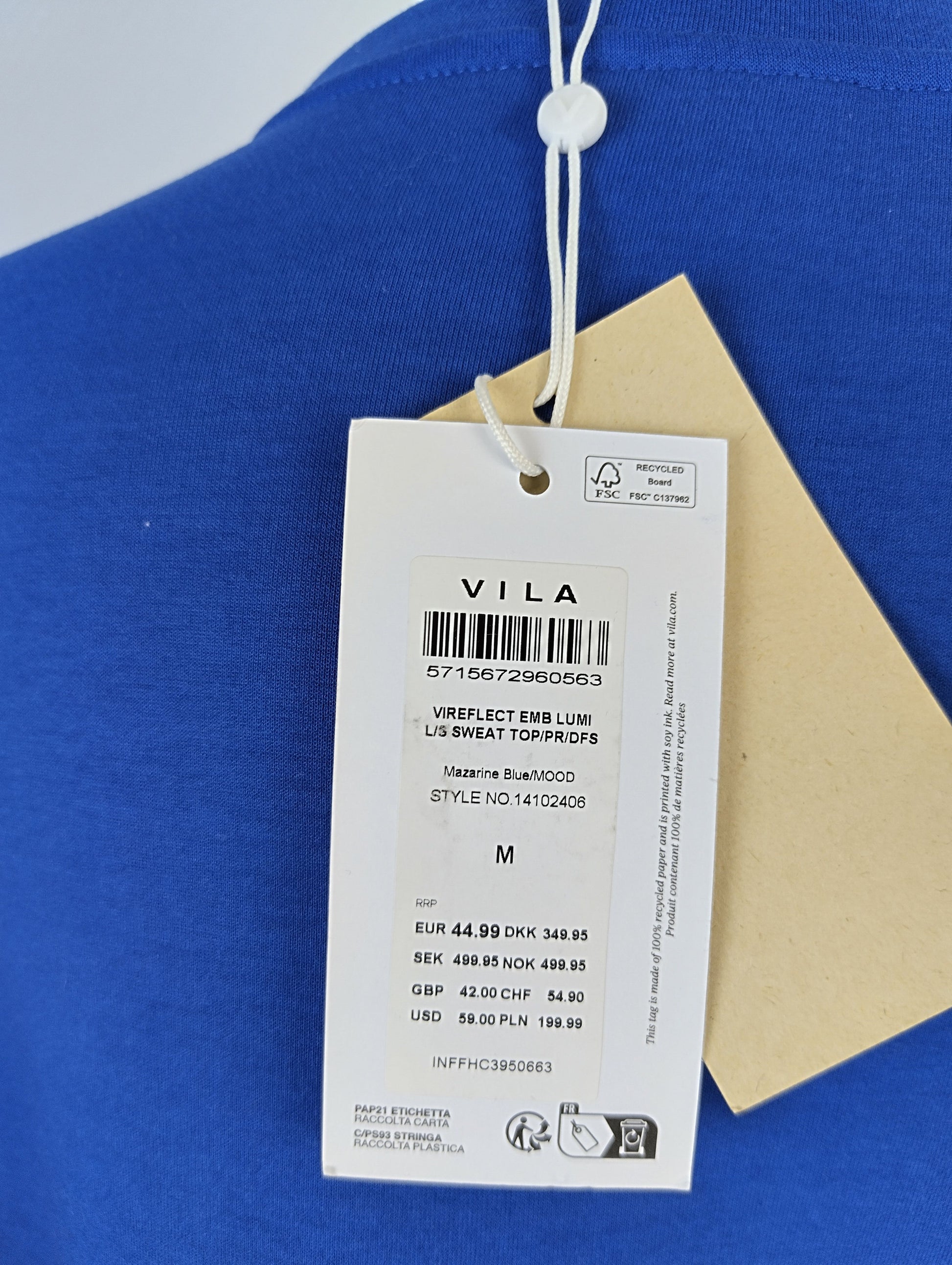 Close-up of VILA tag on Mazarine Blue 'MOOD' Sweatshirt