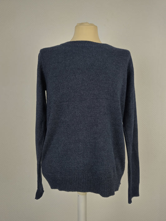 Front view of blue knit sweater on mannequin