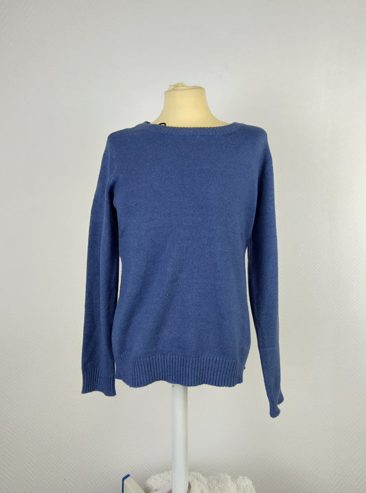 Front view of blue knit sweater on mannequin