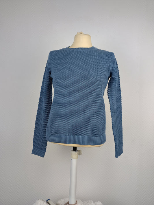 Front view of blue textured knit sweater on mannequin