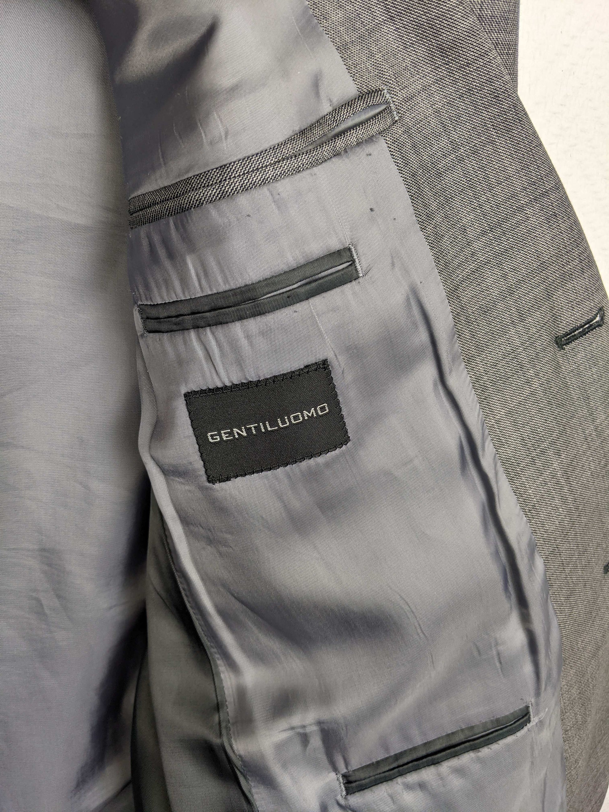 Interior label of Gentiluomo grey textured blazer