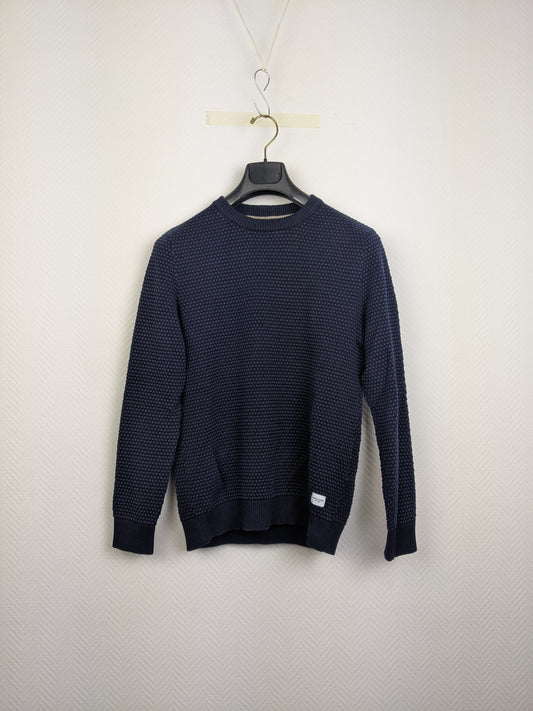 Front view of navy blue textured sweater