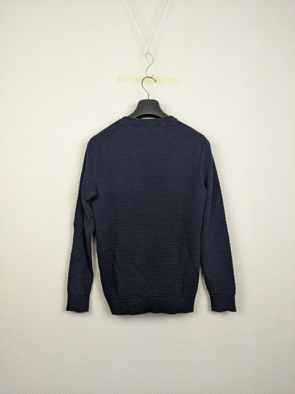 Back view of navy blue textured sweater