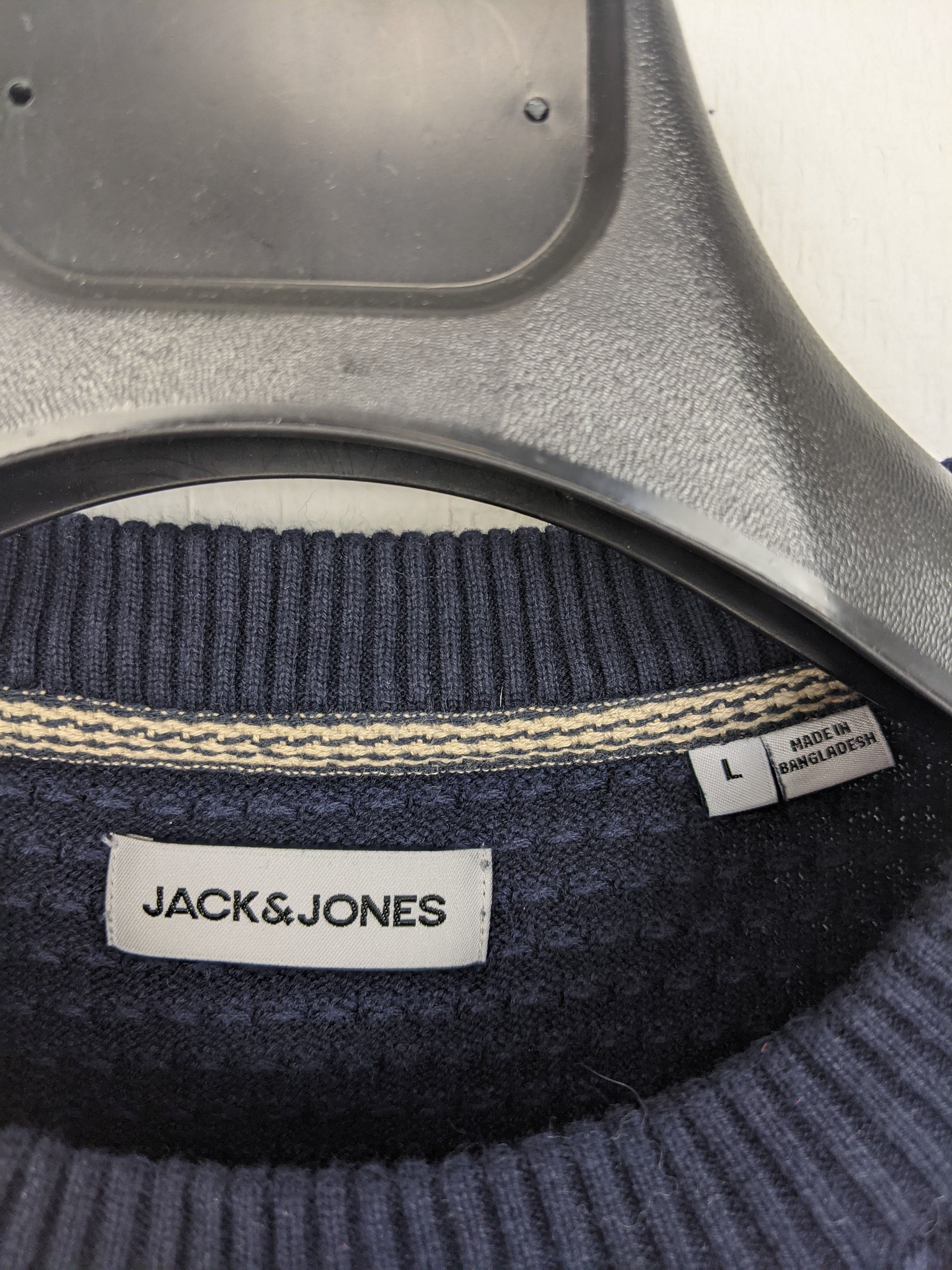 Label showing Jack & Jones brand and size Large